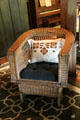 Arts & Crafts woven willow stick arm chair with pillow at Stickley Museum at Craftsman Farms. Morris Plains, NJ.