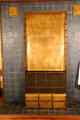 Bedroom fireplace with blue surround & copper repousse slogan at Craftsman Farms. Morris Plains, NJ.