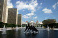 Alexander Calder's sculpture Triangles and Arches sits in Empire Plaza fountain in front of Agency Towers, State Capitol & The Egg. Albany, NY.