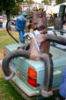 Car Gremlins sculpture by Doug McCallum in Art on Wheels Fair. Buffalo, NY