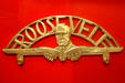 Roosevelt campaign brass with flying $ sign in Presidential Museum. Hyde Park, NY.