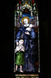 Stained glass windows with St. Vincent de Paul in Sage Chapel on Cornell Campus. Ithaca, NY.