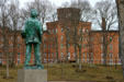 Sculpture of Mark Twain looks over Cowles Hall at Elmira College. Elmira, NY.