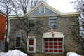 Stone heritage house converted carriage house. Rochester, NY.