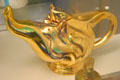 Free form tea pot with golden surface at The Strong National Museum of Play. Rochester, NY.