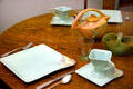 Arts & Crafts style dinner service on oak table at The Strong National Museum of Play. Rochester, NY.