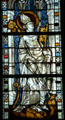 St Servatius, bishop of Tongres, crushing dragon of heresy stained glass from the church at Boppard-am-Rhein at The Cloisters. New York, NY.