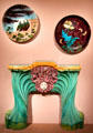 Earthenware dishes by Théodore Deck over Art Nouveau fireplace surround attrib. Désiré Muller all of France at Metropolitan Museum of Art. New York, NY.