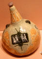 Porcelain bottle with scene of children by Taxile-Maximin Doat for Sèvres of France at Metropolitan Museum of Art. New York, NY.