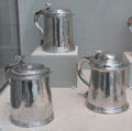American silver tankards by John Noyes of Boston; Daniel Christian Fueter of New York City; & Philip Syng Jr. of Philadelphia at Metropolitan Museum of Art. New York, NY.