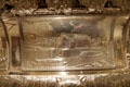 Erie Canal scene detail of silver presentation vase of by Thomas Fletcher & Sidney Gardiner of Philadelphia at Metropolitan Museum of Art. New York, NY.