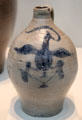 Stoneware jug painted with cobalt blue Great Seal of USA prob. from New York state at Metropolitan Museum of Art. New York, NY.