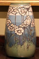 Earthenware vase with Queen Anne's Lace flowers by Sara Galner for Paul Revere Pottery of Boston at Metropolitan Museum of Art. New York, NY.