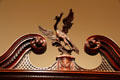 Bird carving detail atop Chest-on-Chest from Philadelphia, PA attrib. Thomas Affleck with carvings attrib. to James Reynolds at Metropolitan Museum of Art. New York, NY.