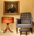 Gulian Verplanck portrait by John Wesley Jarvis over work table, leather library chair & footstool all at Metropolitan Museum of Art. New York, NY.