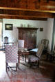 Schenck House parlor with cupboard & chairs at Old Bethpage Village. Old Bethpage, NY.
