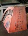 Mack's Fancy Bag Rack for dispensing paper bags in Layton General Store at Old Bethpage Village. Old Bethpage, NY.