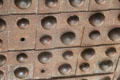 Secret rivet plate slid to hide keyhole on safe in Luyster Store at Old Bethpage Village. Old Bethpage, NY.