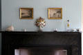 Parlor fireplace mantle bric-a-brac in Kirby House at Old Bethpage Village. Old Bethpage, NY.