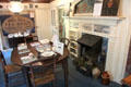 Room with Sag Harbor artifacts, paintings & other artwork by Annie Cooper Boyd at Boyd House museum. Sag Harbor, NY.