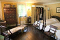 Bedroom with four poster beds, chaise lounge & high boy dresser at Home Sweet Home Museum. East Hampton, NY.