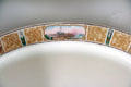 Serving platter by Lamberton Schammell with rim depicting Montauk Lighthouse at Montauk Lighthouse museum. Montauk, NY.