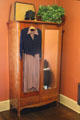 Clothes cabinet with mirrors in sewing room at Vanderbilt Mansion. Centerport, NY.