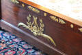 Footboard detail of replica of Napoleon's bed in Mr. Vanderbilt's bedroom at Vanderbilt Mansion. Centerport, NY.