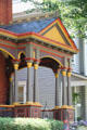 Queen Anne-style brightly painted porch off Frost Parkway. Tiffin, OH.