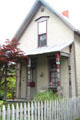Gothic-style house with turned porch posts. Tiffin, OH.