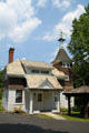 Wash house with tower & windmill outside Col. Simon Perkins Stone Mansion. Akron, OH.