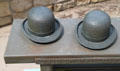 Bronze bench with bowler hats like those worn by Wright Brothers at Wright Brothers Aviation Center. Dayton, OH.