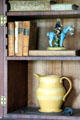 Books & creamware pitcher at Johnston Farm. Piqua, OH.