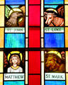 Evangelists symbols for Sts Matthew, Mark, Luke & John stained glass window in Old Stone Church. Cleveland, OH.