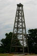 Early wooden oil derrick at Woolaroc Ranch. Bartlesville, OK.