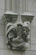 Gargoyle holding highrise on facade of Philtower. Tulsa, OK.