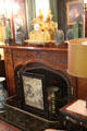 South Parlor/Sitting Room fireplace with moulded bricks & panelled mantel at Kingscote. Newport, RI.