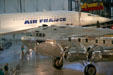 Concorde over Boeing 307 Stratoliner Clipper Flying Cloud at National Air & Space Museum. Chantilly, VA.