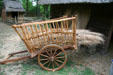 Handcart with straw at Henricus. VA.