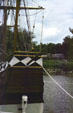 Stern of ship Godspeed against stockade of Jamestown Settlement. VA.